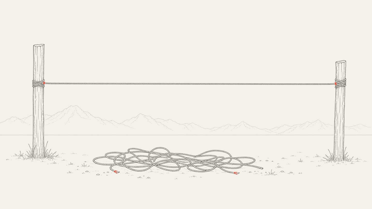 A line pulled taut between two posts across the frame, with a slack, tangled line coiled on the ground beneath it.